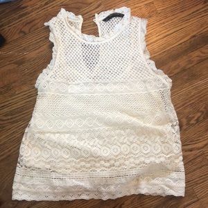 Lace shirt with camisole underneath.